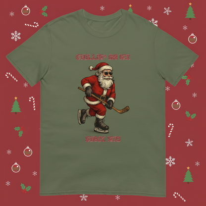 Santa Chilling on ice. He's a stone cold sniper in his red suit: a master of hockey