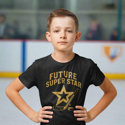 Child wearing a black t-shirt with 'Future Super Star' text and star graphic. He has the intensity to play in the Chel