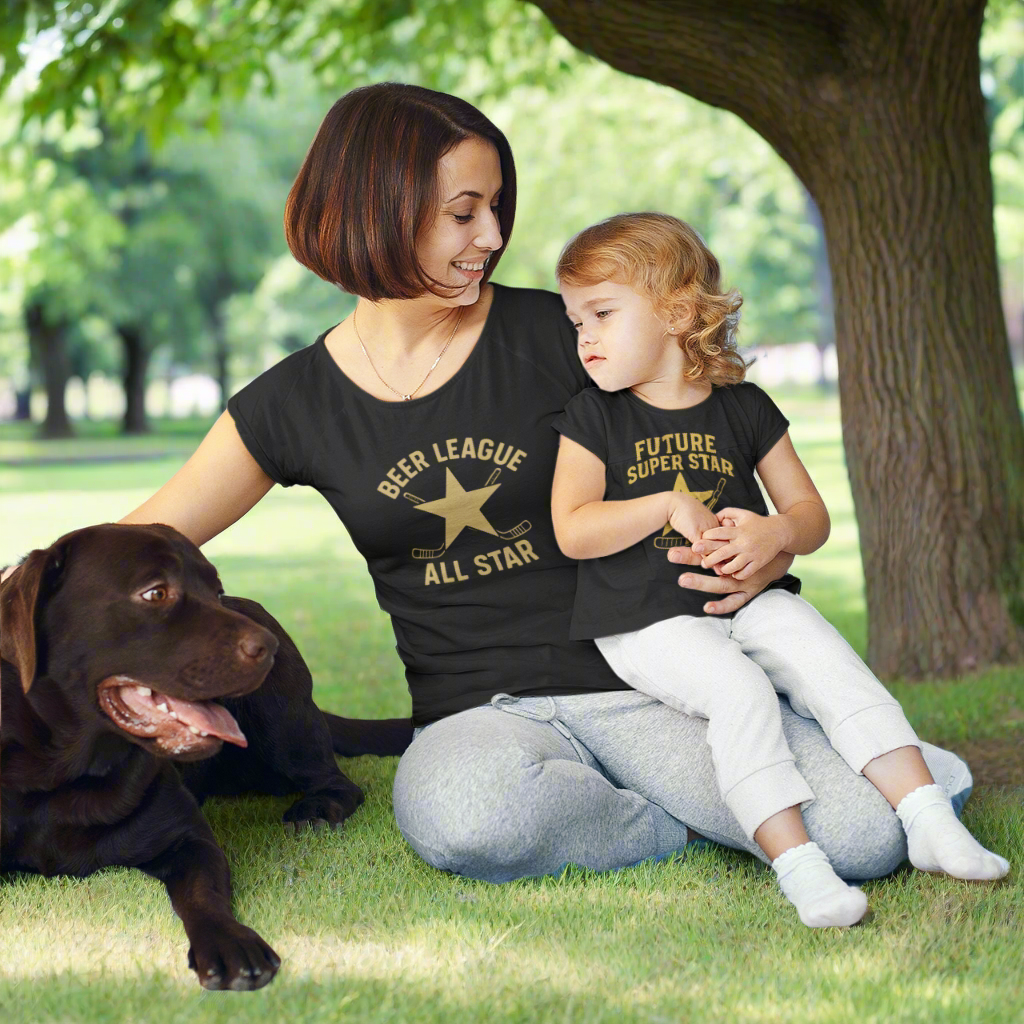 Mother and daughter bonding in fun graphic tees — perfect hockey family gift set.