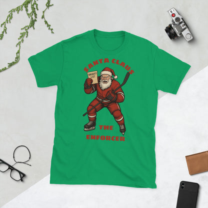 A green T-shirt with an angry Santa Clause holding up the naughty list.