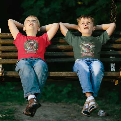 Two children sitting on a swing gazing up at evening stars. They wear shirts with an angry puck and hockey sticks surrounded by evergreen boughs, ornaments and gingerbread men. The caption reads, "Slapshot Santa's Stinky Sweaters."